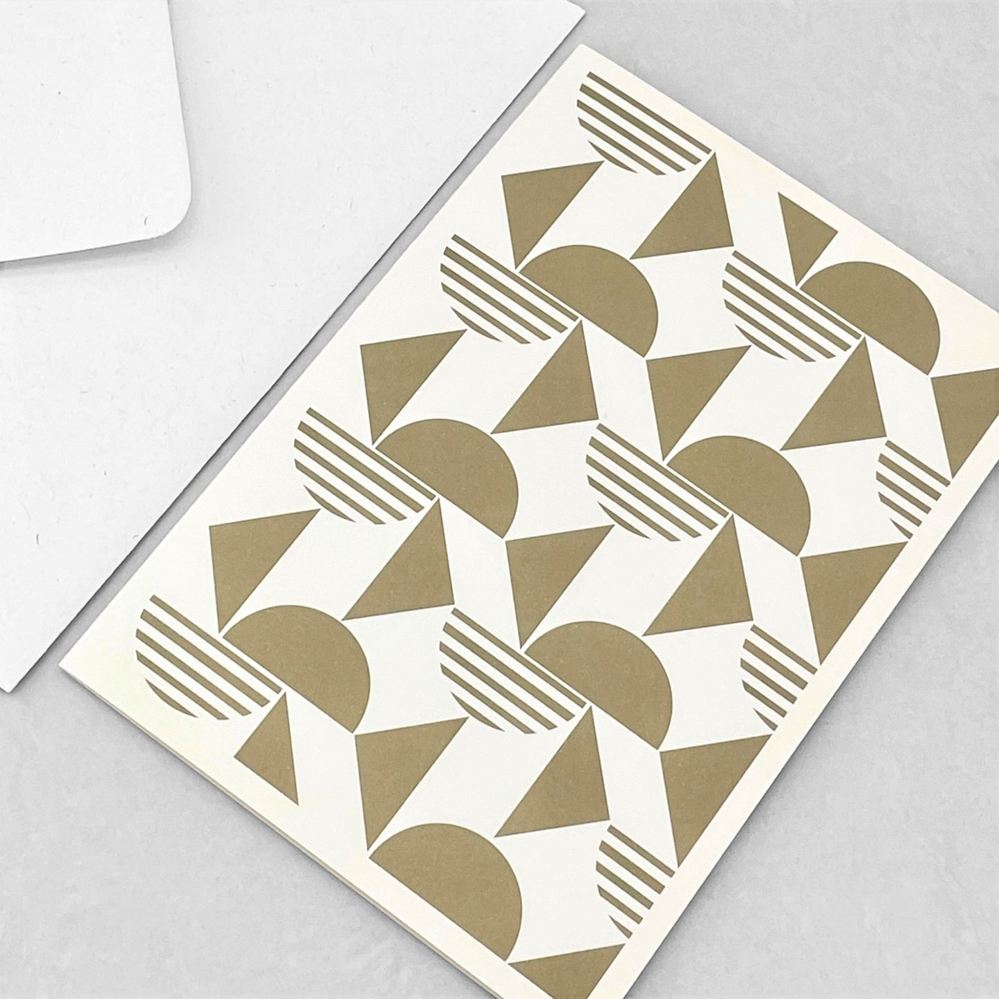 Greeting card with gold abstract geometric design by Amaretti Design