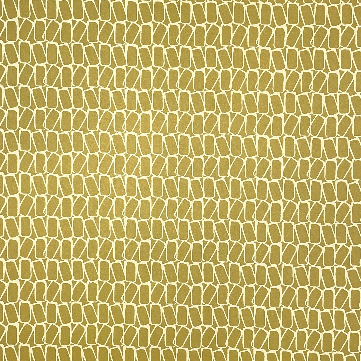 wrapping paper by Anne Davison Studio. Creamy domino outlined shapes on a mustard background.