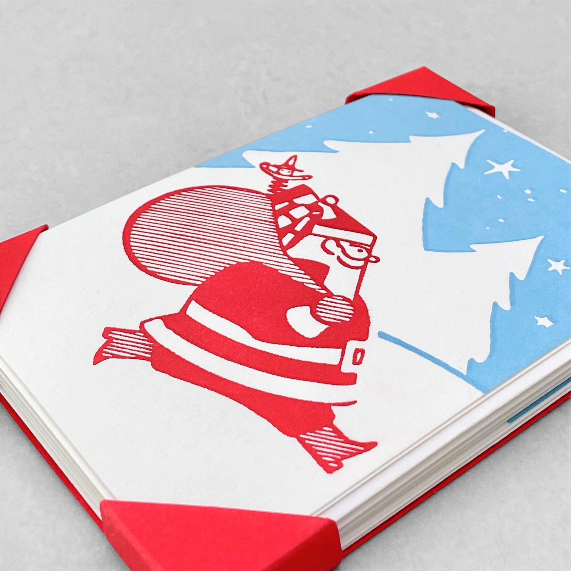 small greetings card with father christmas carrying a bag of presents , by Archivist Gallery