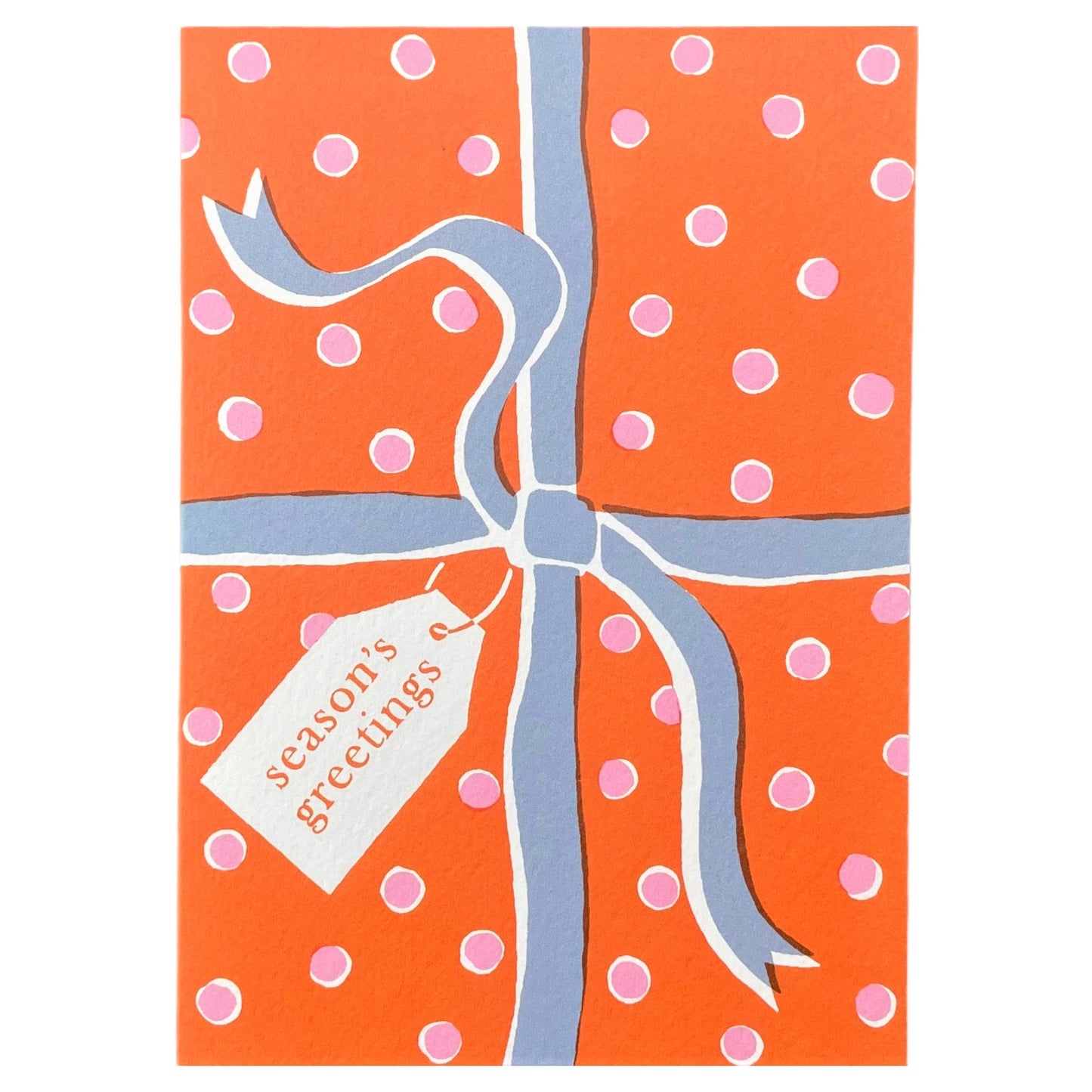 Greetings card with an image of a present wrapped with a bow and a gift tag with "Season's greetings" in orange, pink and blue, by Ariana Martin