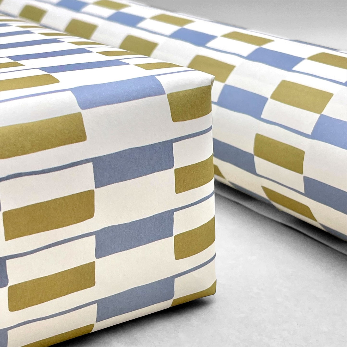 patterned paper gift wrap with a geometric blue and green rectangular design on white background, by Ariana Martin