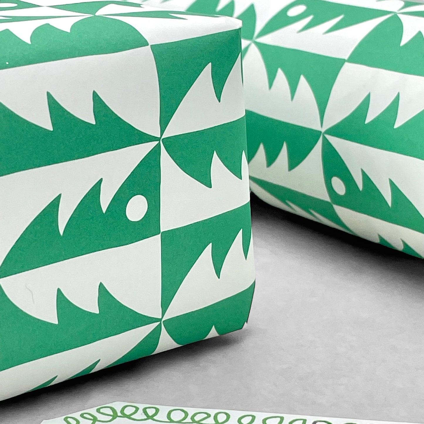 patterned paper, gift wrap, with all over pattern of green and white trees, by Ariana Martin