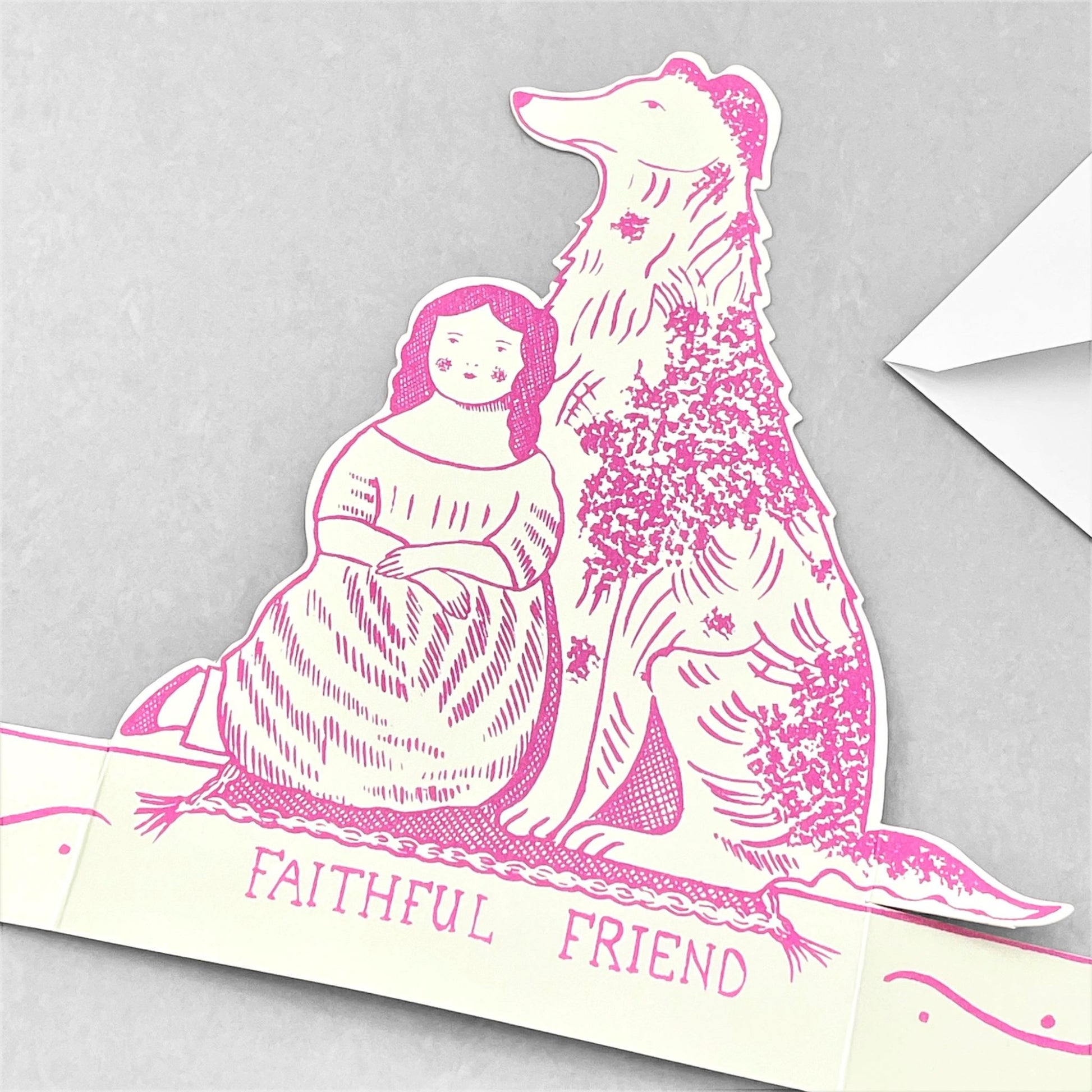 A cut-out and stand-up greetings card of a pink dog, by Elizabeth Harbour