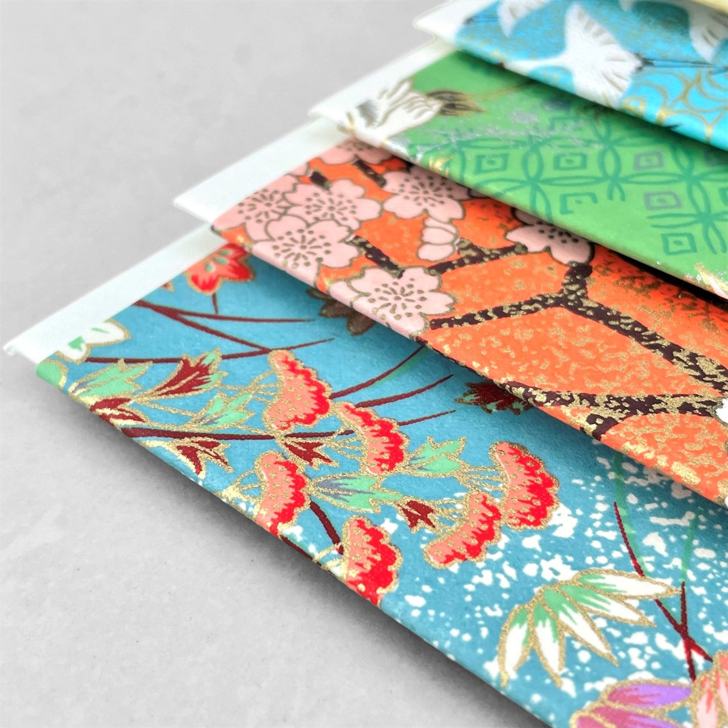 japanese silk-screen printed greetings card with a multi-colour bouquet of flowers pattern on a teal backdrop by Esmie