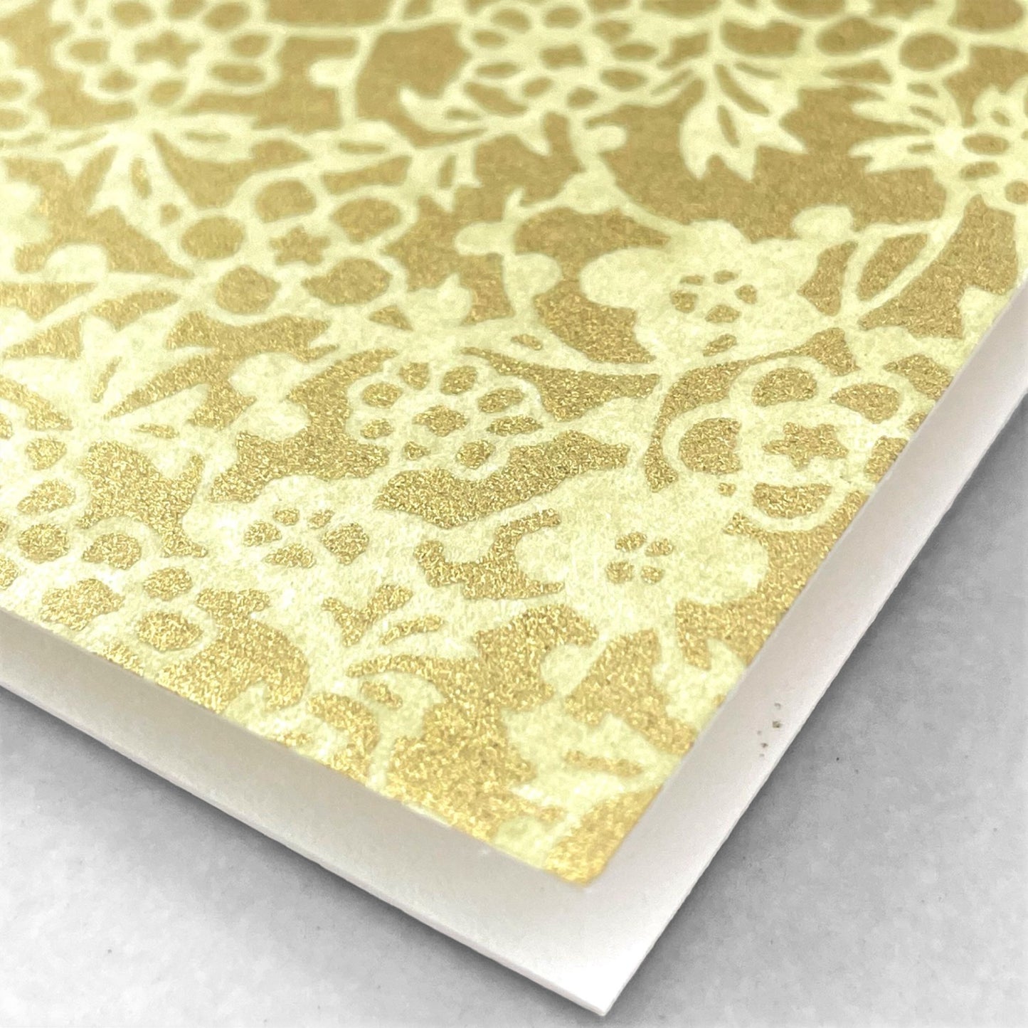japanese silk-screen printed greetings card with a floral repeat pattern in two-tone gold by Esmie