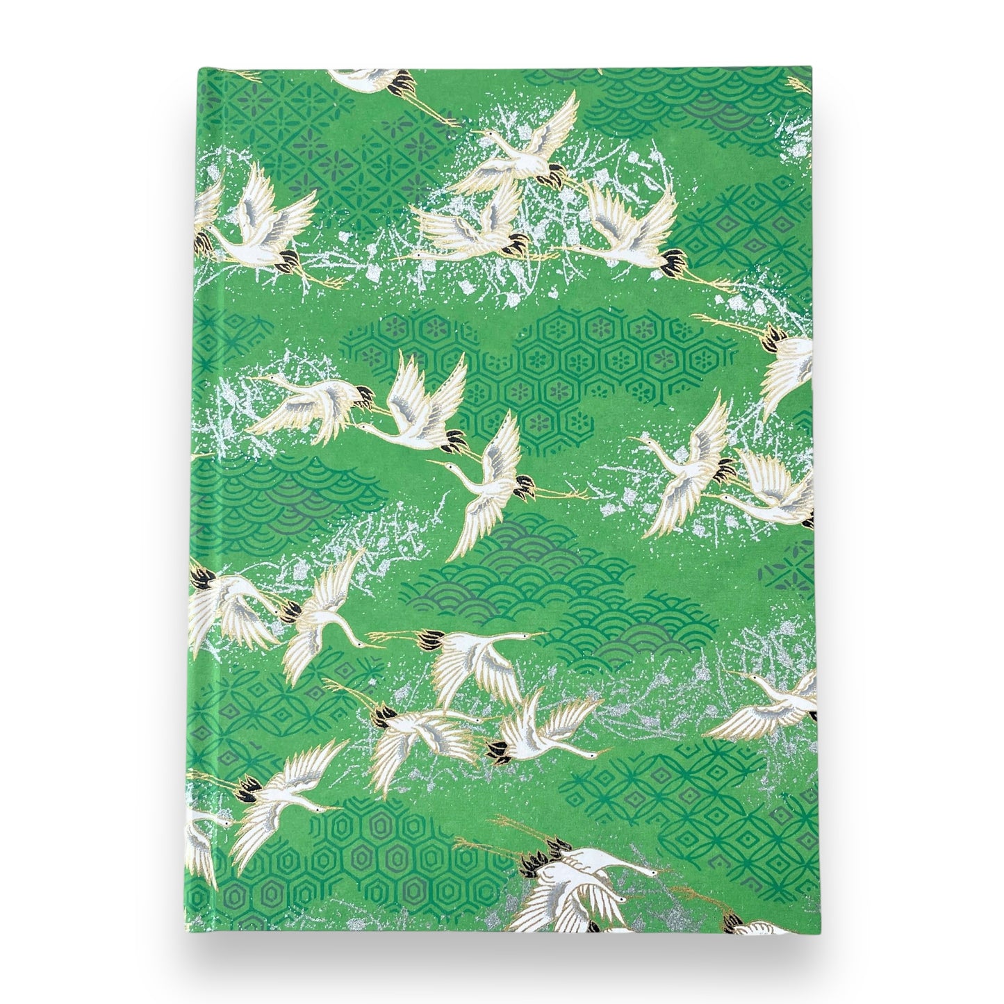 hardback A5 plain notebook with cover made of japanese silkscreen chiyogami paper. Large white cranes in flight on a green background by Esmie