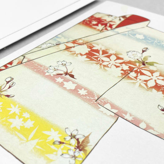 greetings card of a drawing of a floral folded kimono in red, yellow. blue and pink by Ezen Design