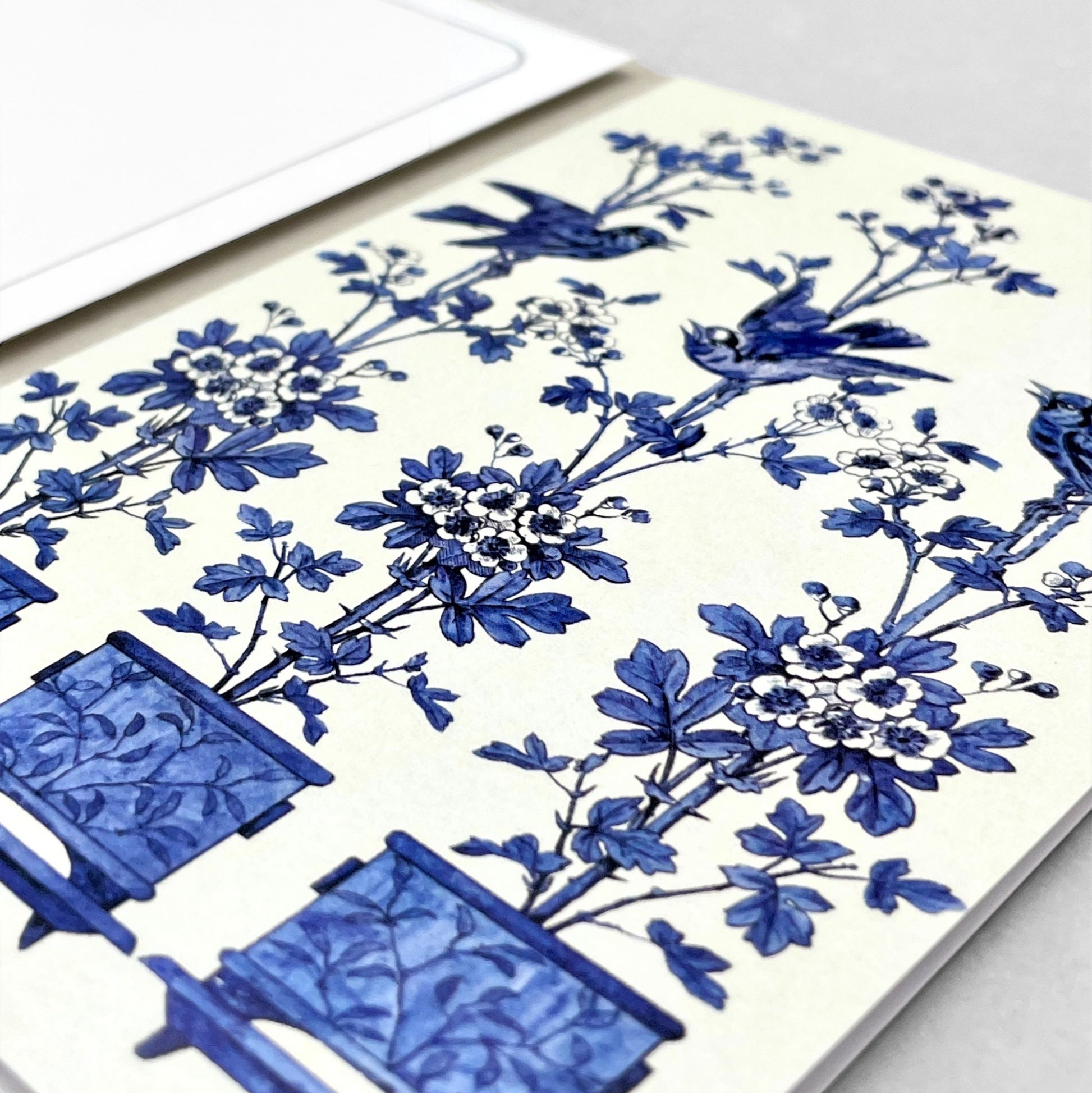 greetings card showing three blue flower pots with a bird in each by Ezen Design