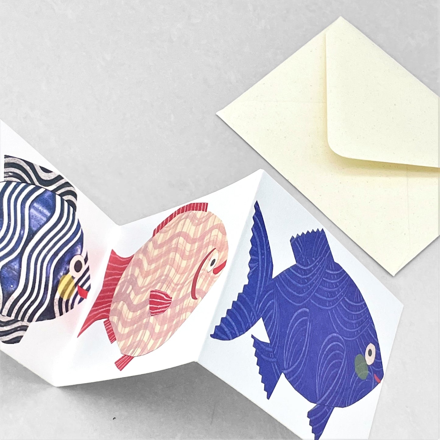 concertina greetings card of four colourful fish on four folds, by Hadley Paper Goods