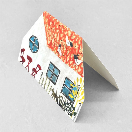 greetings card of a colourful cottage by Hadley Paper Goods, double sided