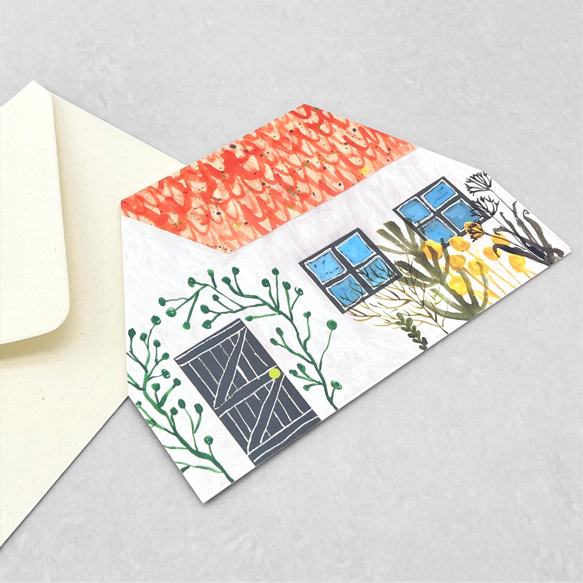 greetings card of a colourful cottage by Hadley Paper Goods, double sided