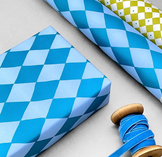 wrapping paper with large diamond repeat pattern in light and dark teal-blue by Heather evelyn