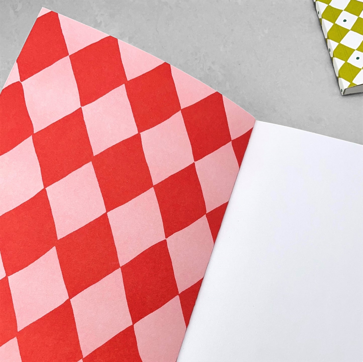 A5 notebook with diamond pattern in red and pink by Heather Evelyn