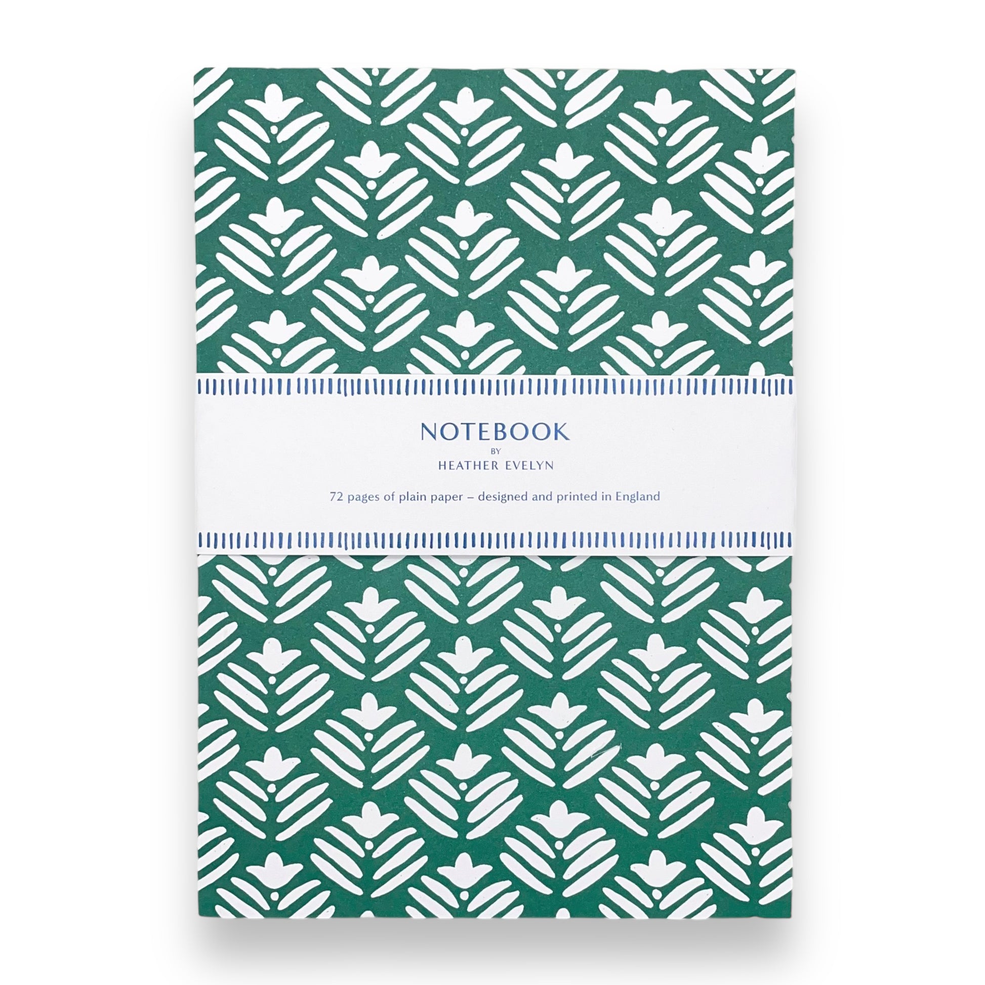 A5 notebook with dark green cover and a repeat pattern of white flowers by Heather Evelyn
