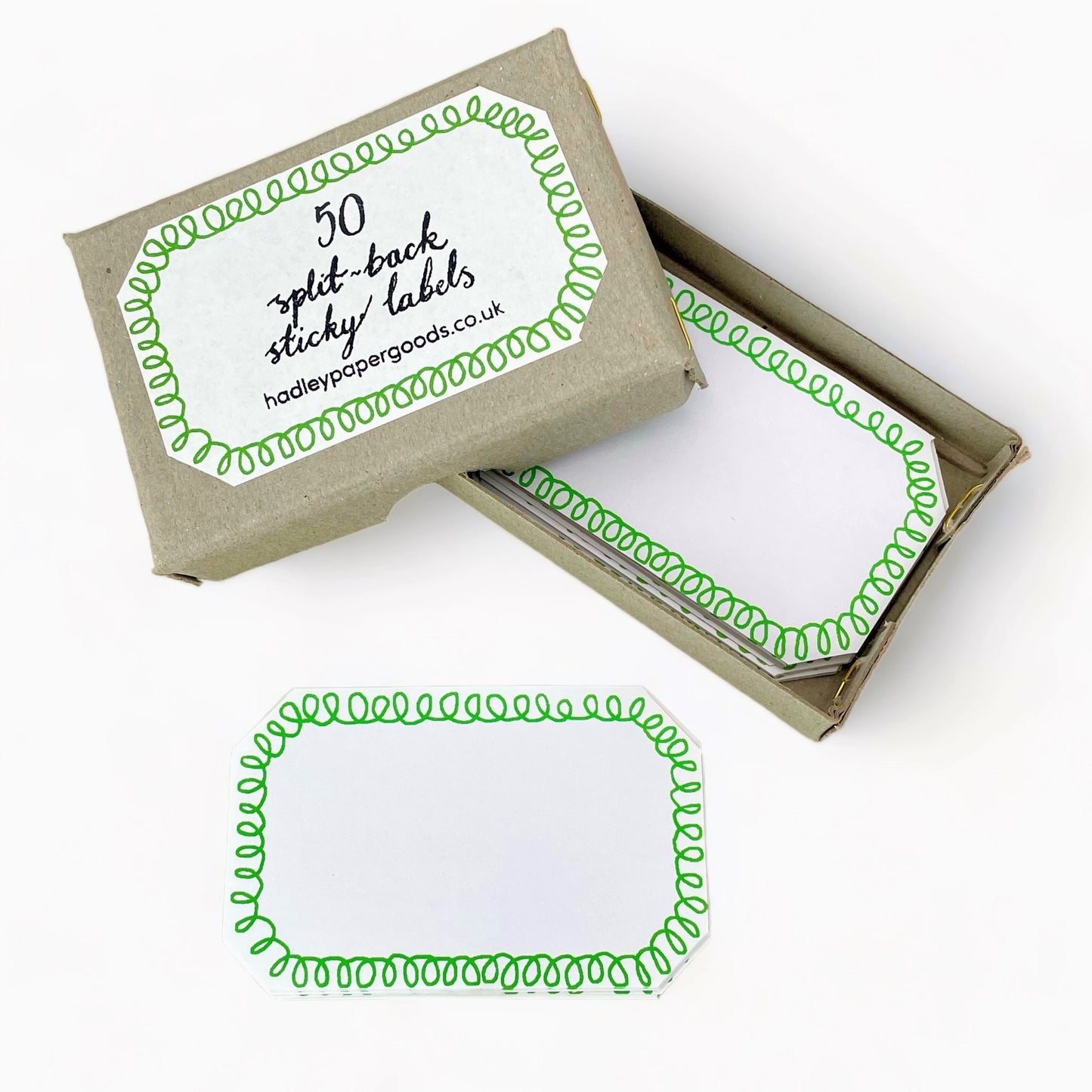 box of 50 white labels with a loopy border in green, by Hadley Paper Goods
