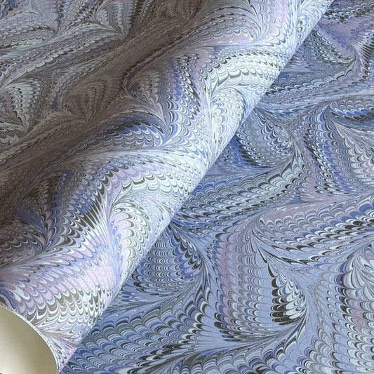 printed marbled wrapping paper by Jemma Lewis with a marbled pattern in blue and purple