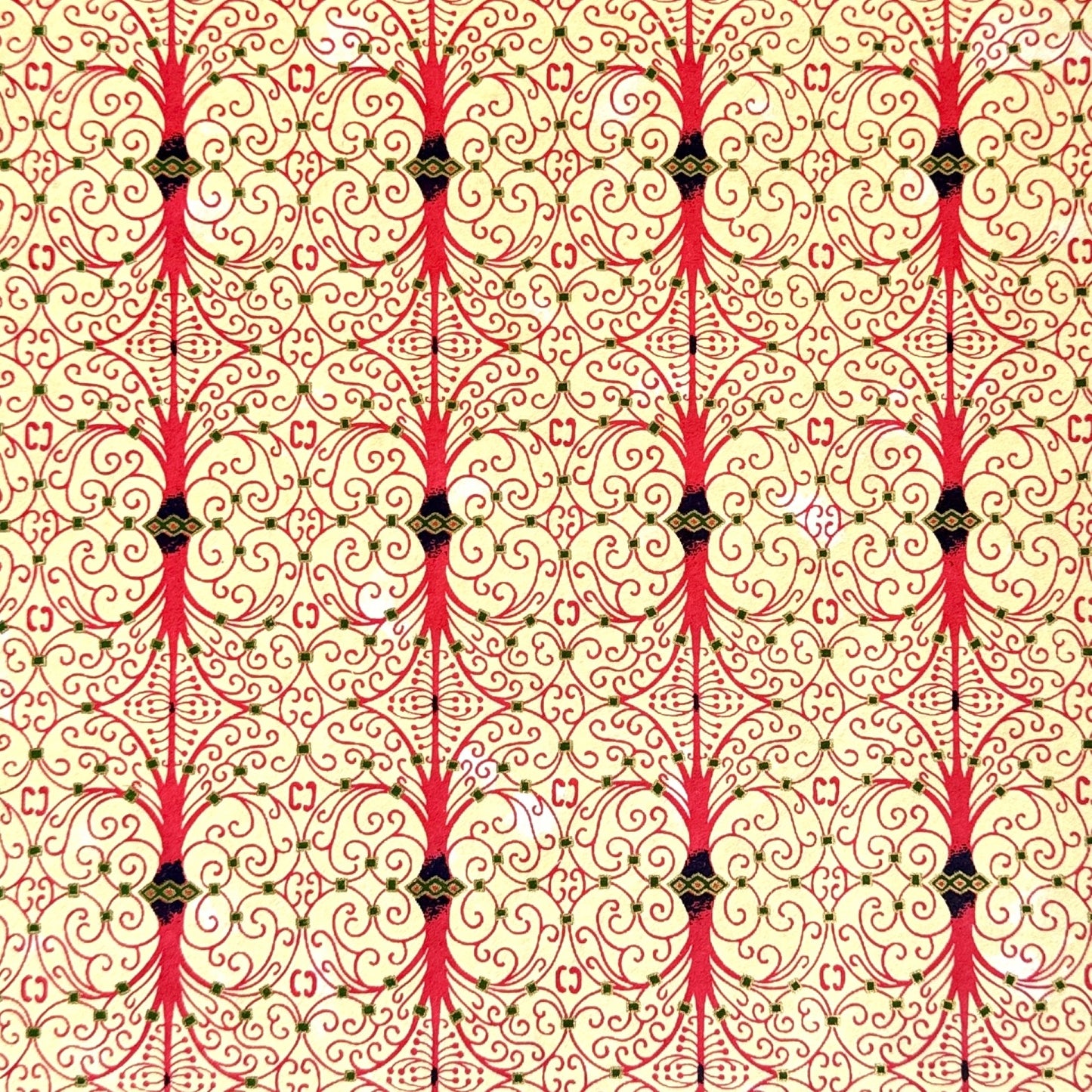Japanese silkscreen chiyogami paper with a intricate filigree trellis design in pink with gold accent