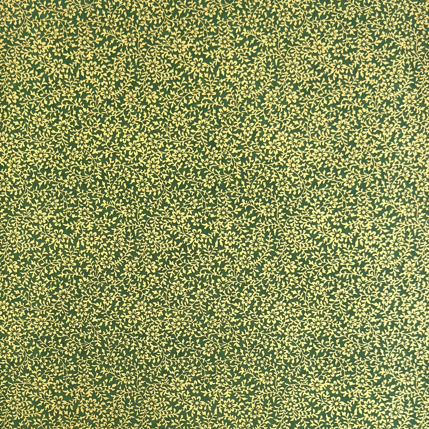 Dainty gold botanical repeat pattern on dark green. Japanese chiyogami paper.