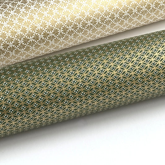 a sheet of Japanese silkscreen printed chiyogami paper with a mini geometric design in gold on green backdrop. close up