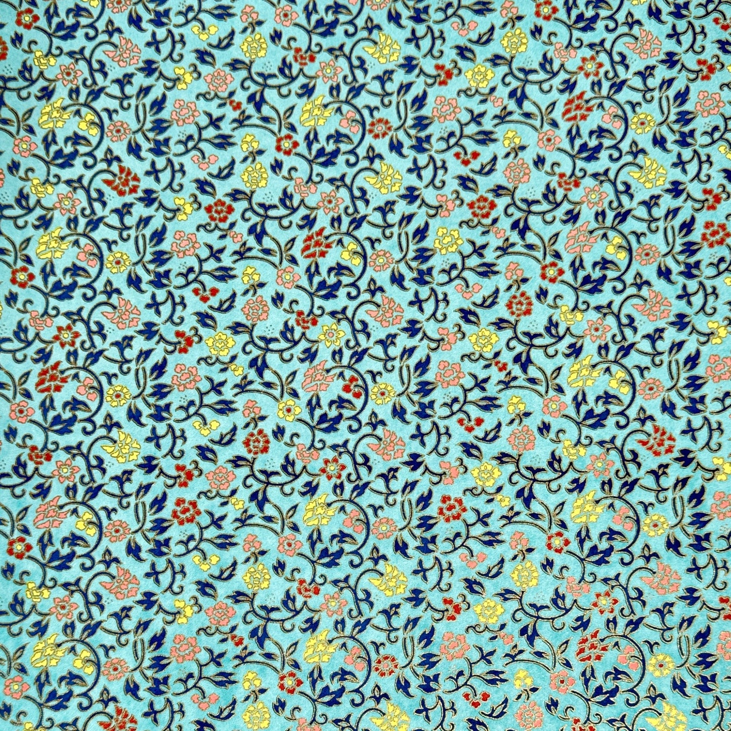 Japanese silkscreen chiyogami paper with a dainty floral pattern in navy, yellow and coral on a teal backdrop. Finished with gold metallic ink.
