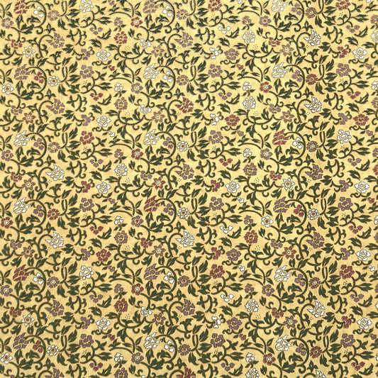 Japanese chiyogami silkscreen paper with a dainty floral pattern on a creamy backdrop and finished with gold metallic ink.