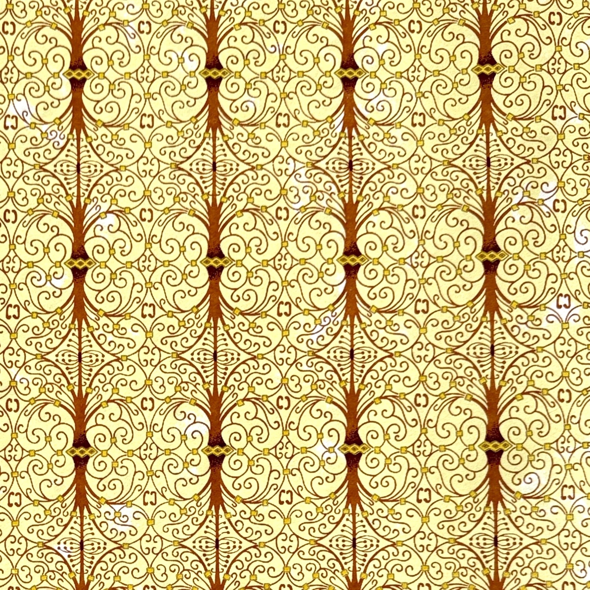 Japanese silkscreen chiyogami paper with a intricate filigree trellis design in brown with gold accent