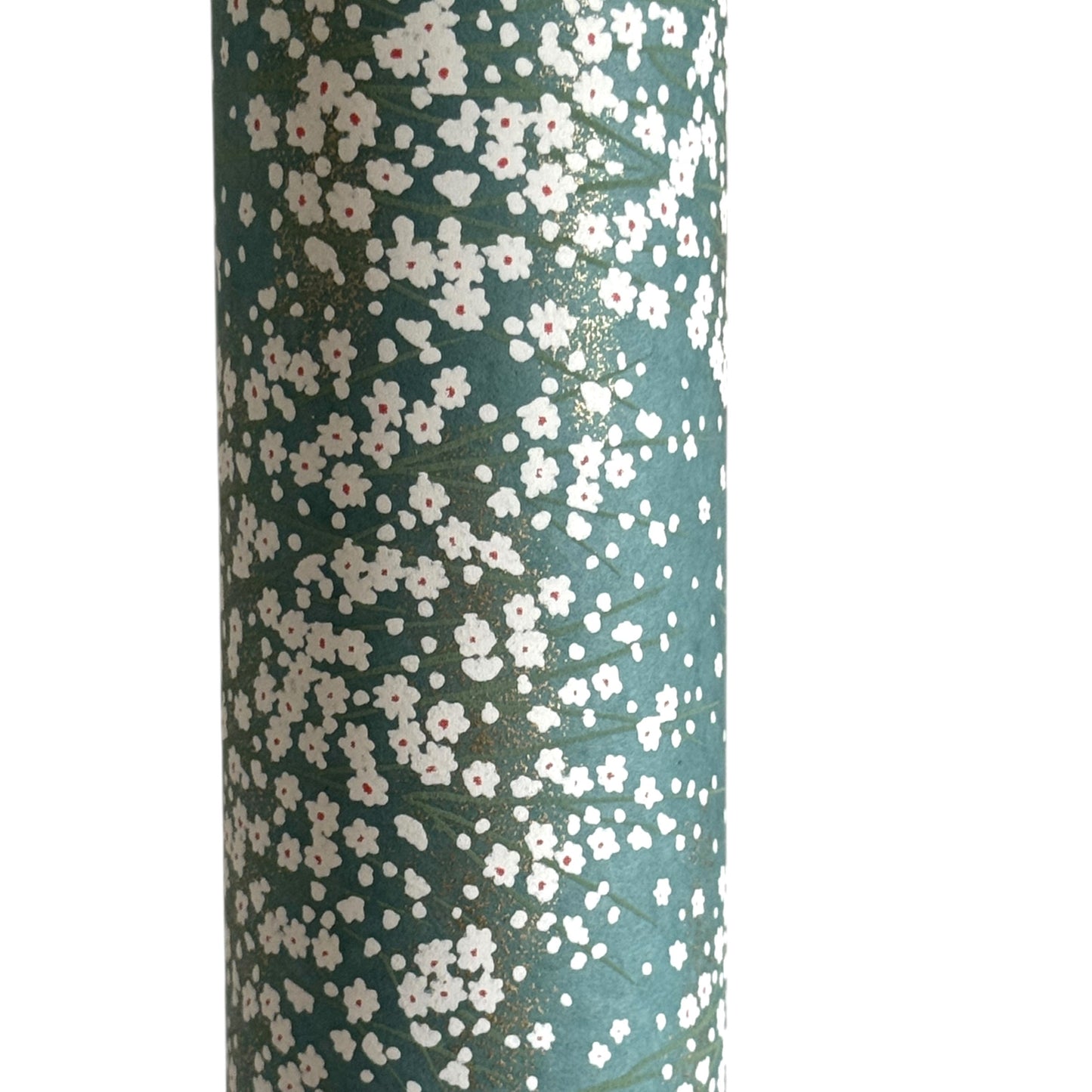 An abundance of tiny white flowers on soft teal with a dusting of gold. Japanese chiyogami paper