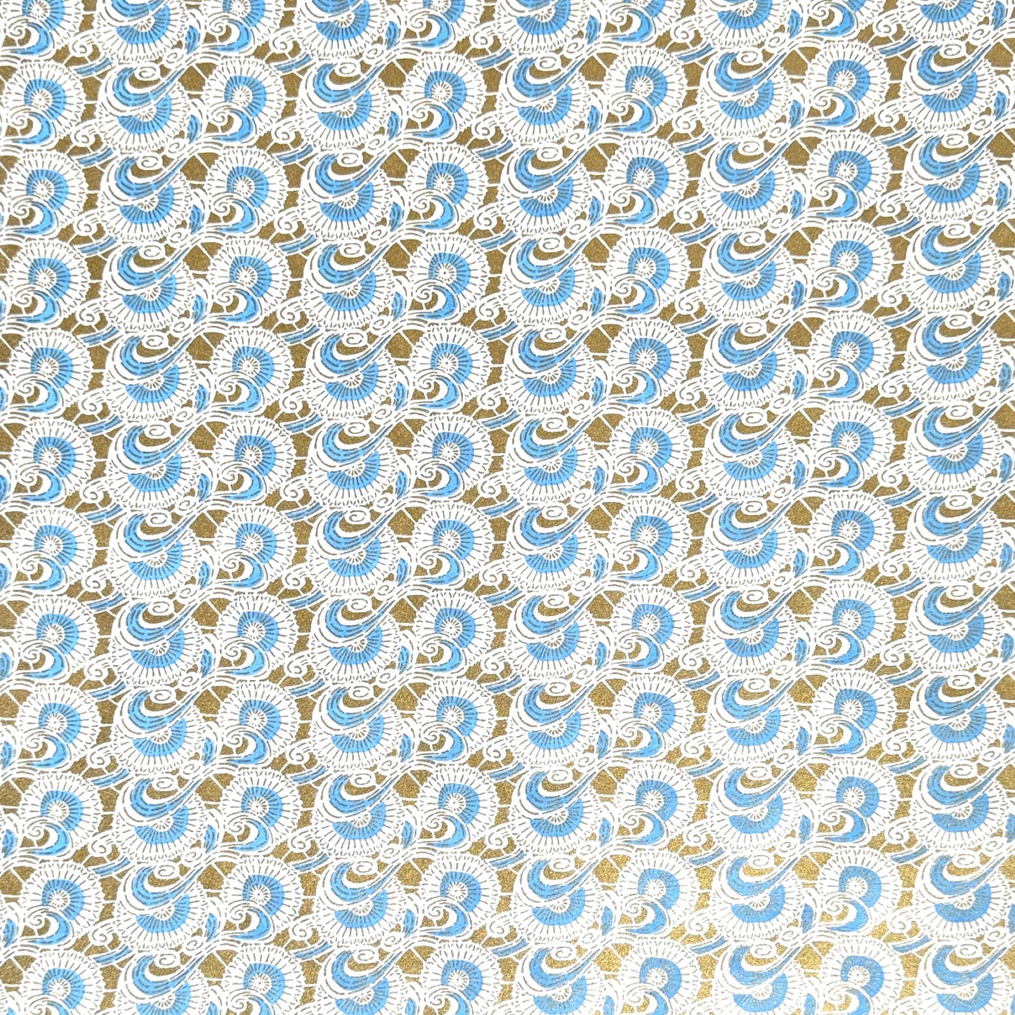 Japanese silkscreen chiyogami paper with a repeat floral pattern in gold an cerulean blue