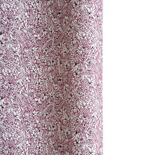a sheet of Japanese silkscreen printed chiyogami yuzen paper with a micro floral pattern in aubergine, white and black
