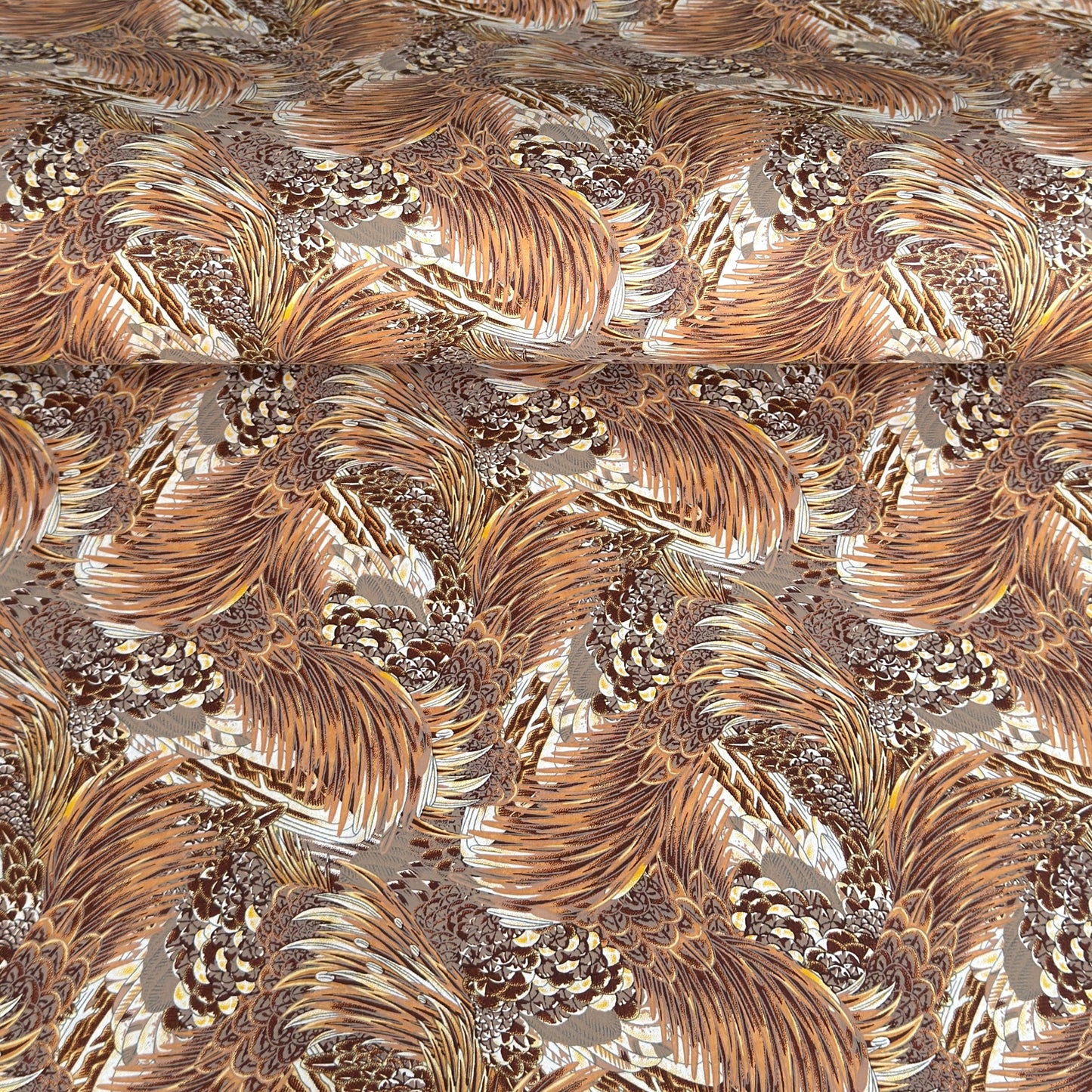 Detailed pattern of the plumage of feathers in brown, beige and ochre. Japanese chiyogami paper
