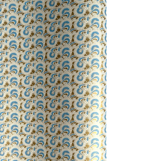 Japanese silkscreen chiyogami paper with a repeat floral pattern in gold an cerulean blue