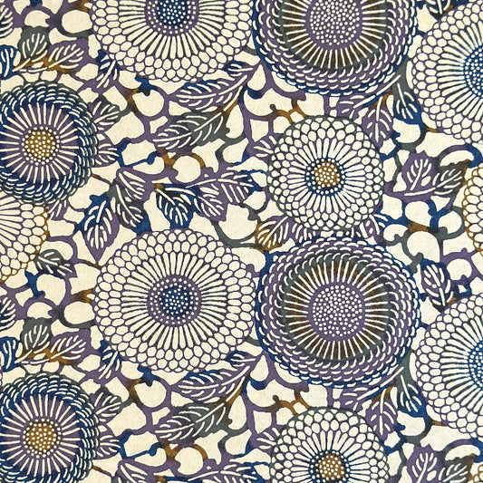 Japanese chiyogami silkscreen printed paper with a floral kiko pattern in purple and blue on a cream backdrop