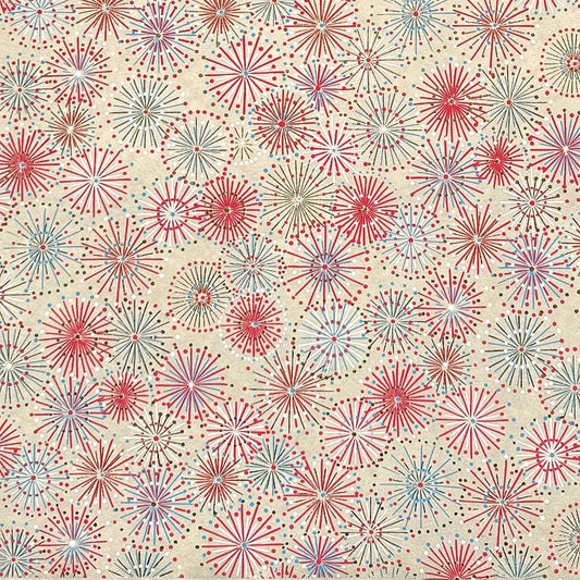 japanese chiyogami silkscreen printed paper with a pattern of fireworks in reds, pinks and lilacs on an ivory background.