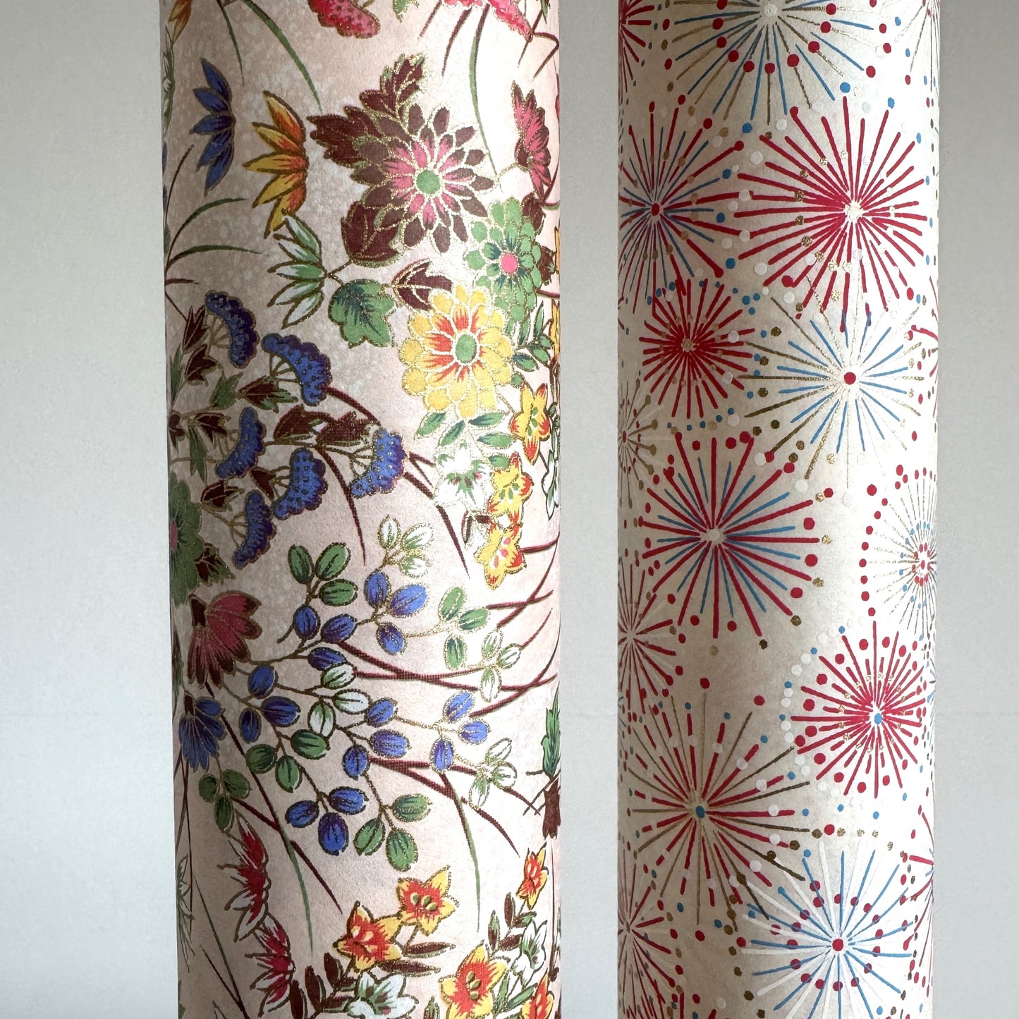 japanese silkscreen printed paper with a delicate floral bouquet design on blush pink background. Close up