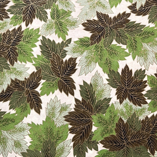 Japanese chiyogami paper with a pattern of green leaves in various tones with gold accent.