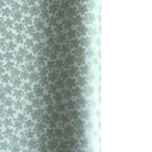 japanese silk-screen paper, chiyogami, with a cherry blossom flower repeat pattern in turquoise and white