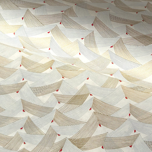 a sheet of Japanese chiyogami paper with gold and silver chevron lines on white paper