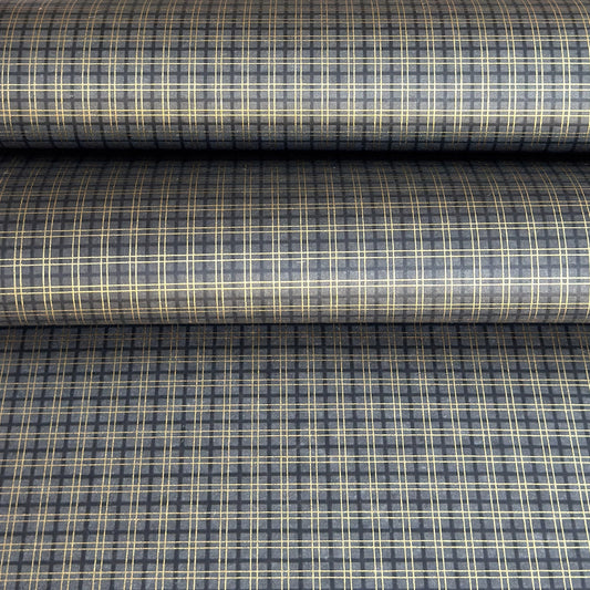 a sheet of Japanese chiyogami paper with a check plaid design in grey, black and gold