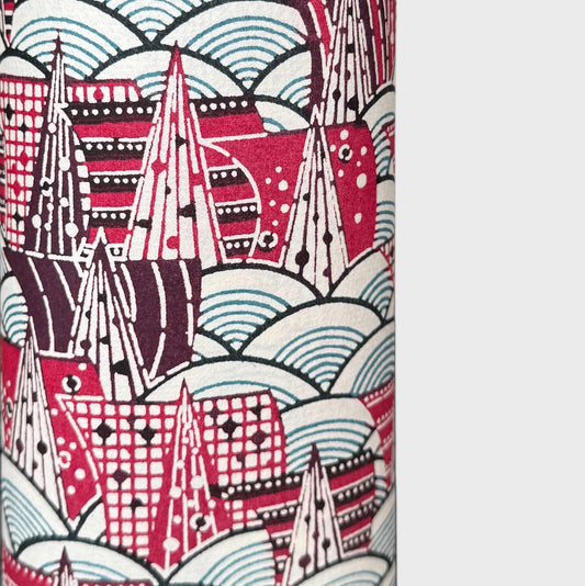 A Japanese skyline with with buildings and rivers. Japanese katazome shi stencil-dyed paper. Close up