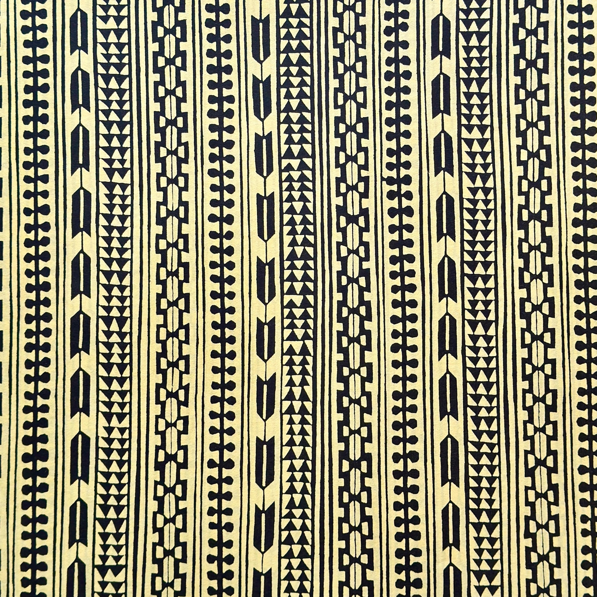 Japanese katazome-shi stencil-dyed paper with striped motifs in black on yellow paper