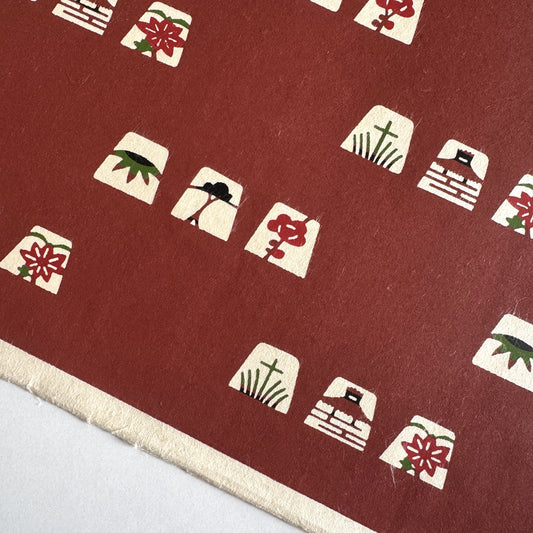 Japanese katazome-shi paper in brown with small Japanese Mon motifs
