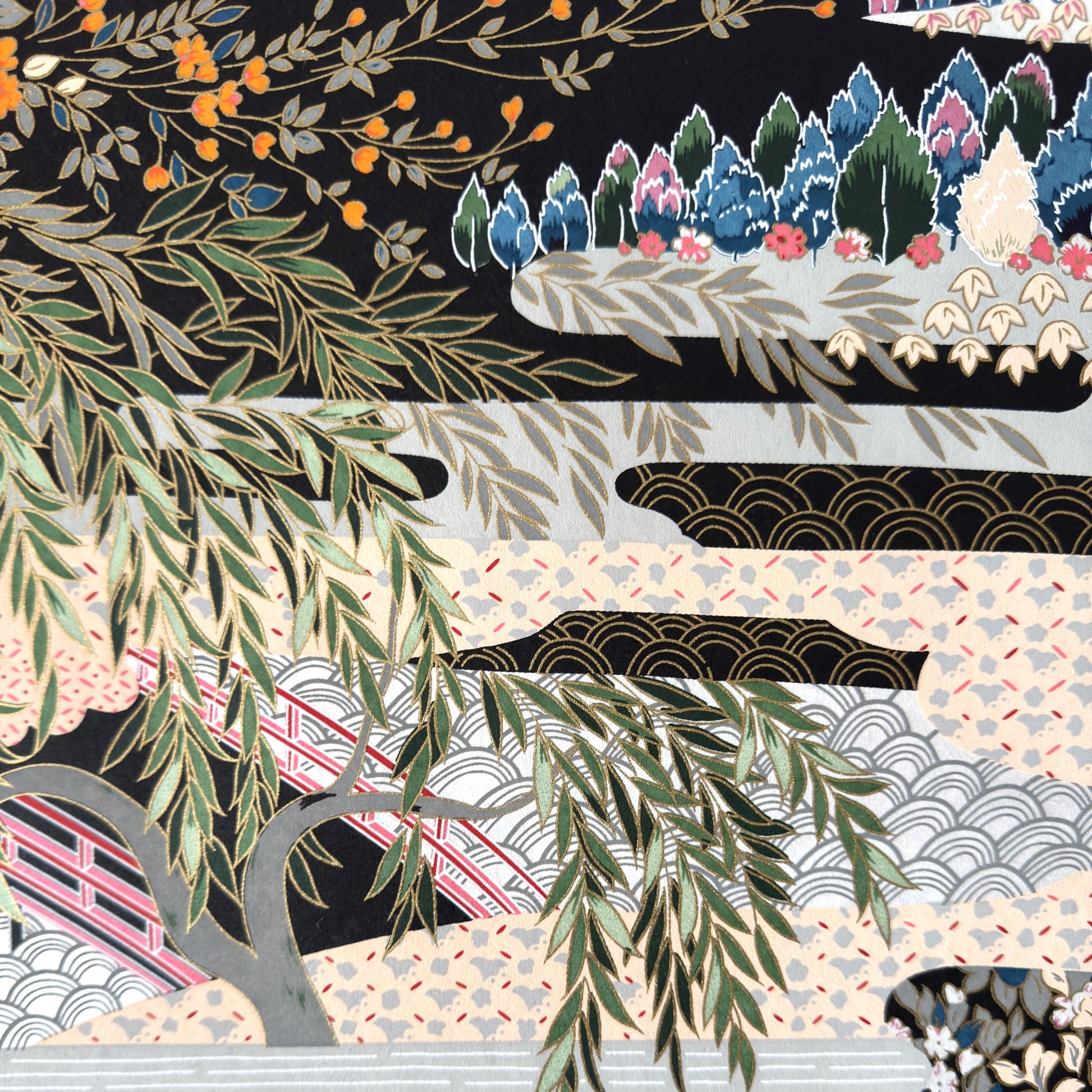 A sheet of Japanese silkscreen printed paper called Sogara which depicts a colourful forest with rivers and mountains in the background. Close up of tree branches in the foreground