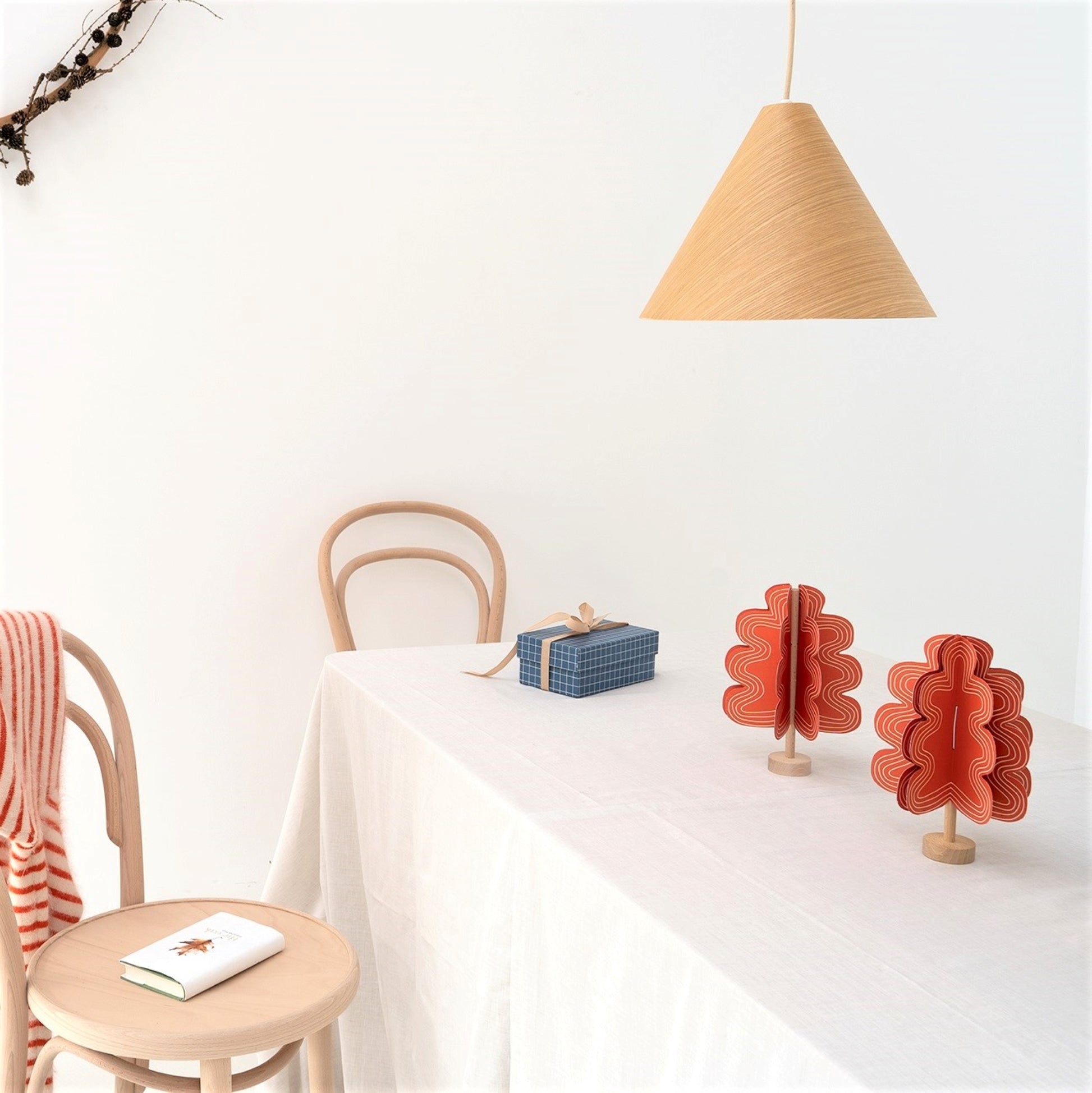 a red oak tree paper craft kit by Jurianne Matter, pictured on a table