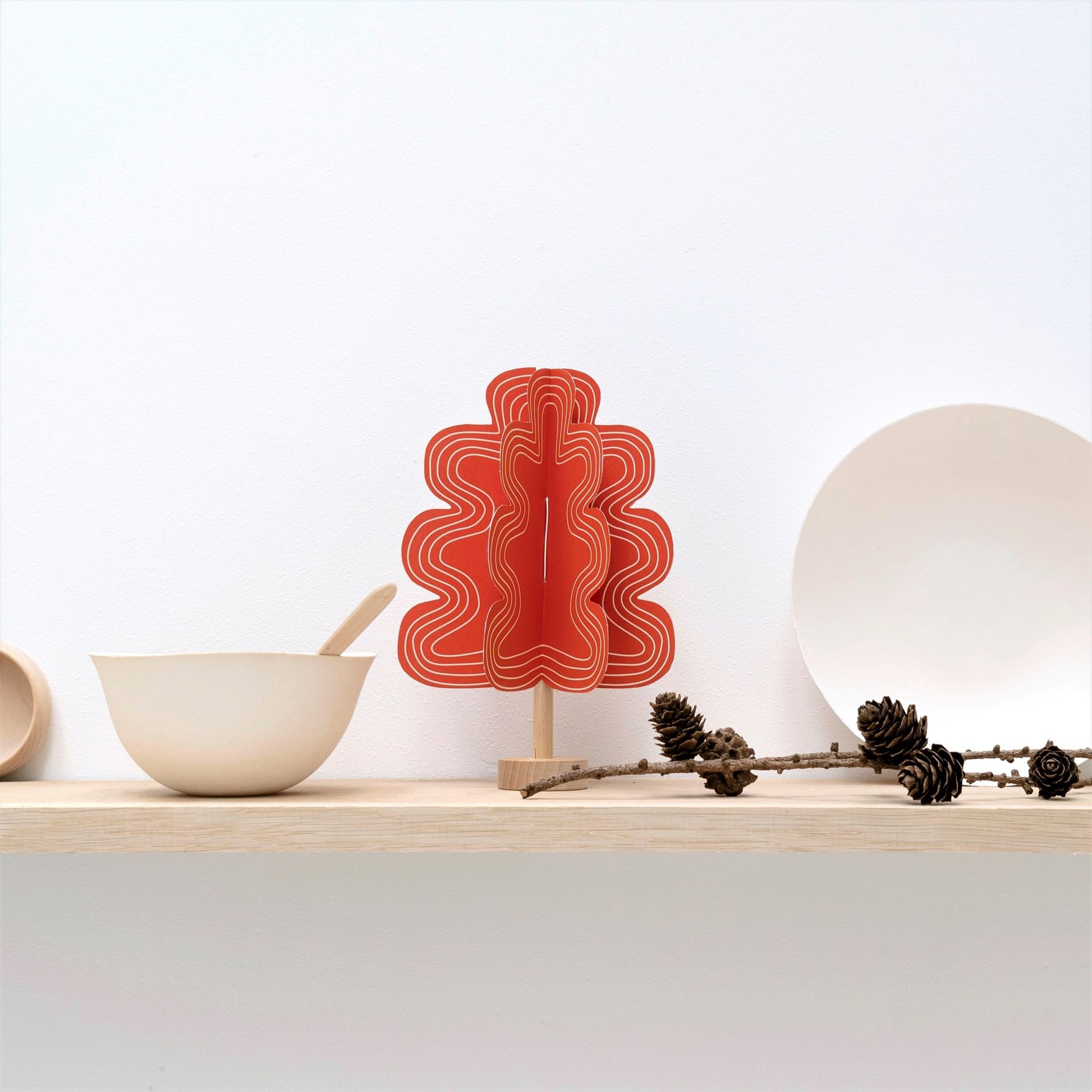 a red oak tree paper craft kit by Jurianne Matter, pictured in a shelf