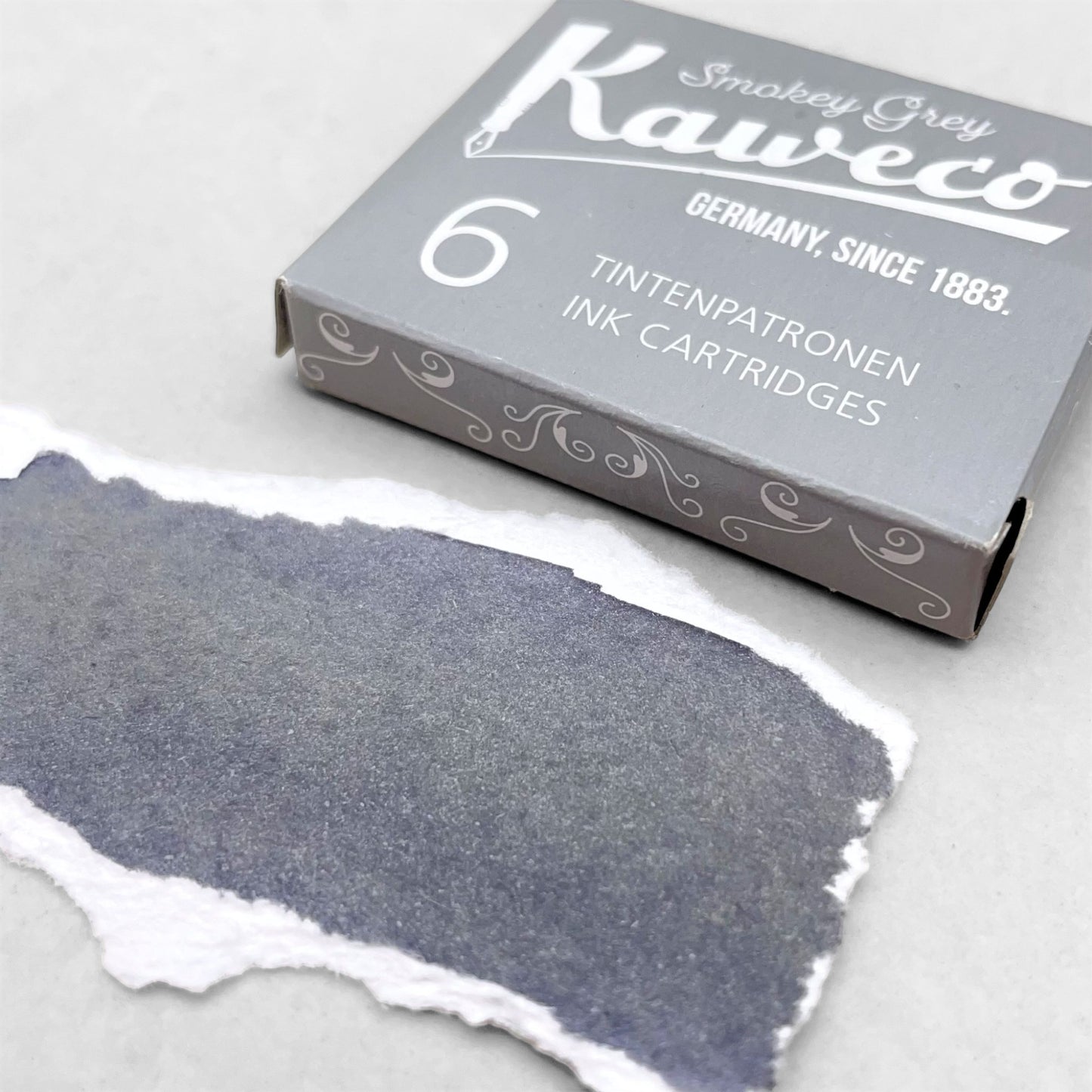 Box of 6 ink cartridges by Kaweco in smokey grey colour