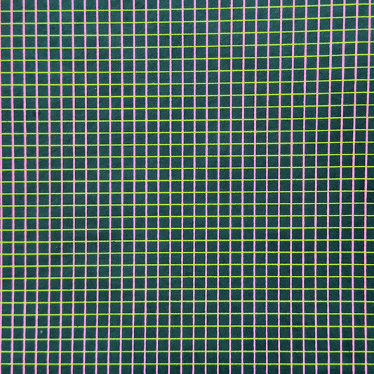a sheet of Nepalese lokta paper with a lime green and pink grid pattern on dark green handmade paper. Close up