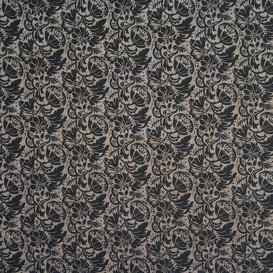 Nepalese handmade decorative lokta paper sheet with a black floral pattern screen printed on a dark taupe lokta paper.