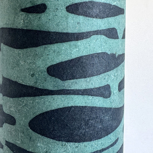 Nepalese handmade decorative lokta paper sheet with an abstract pattern in aqua and teal. Batik dyed using carved wooden blocks.