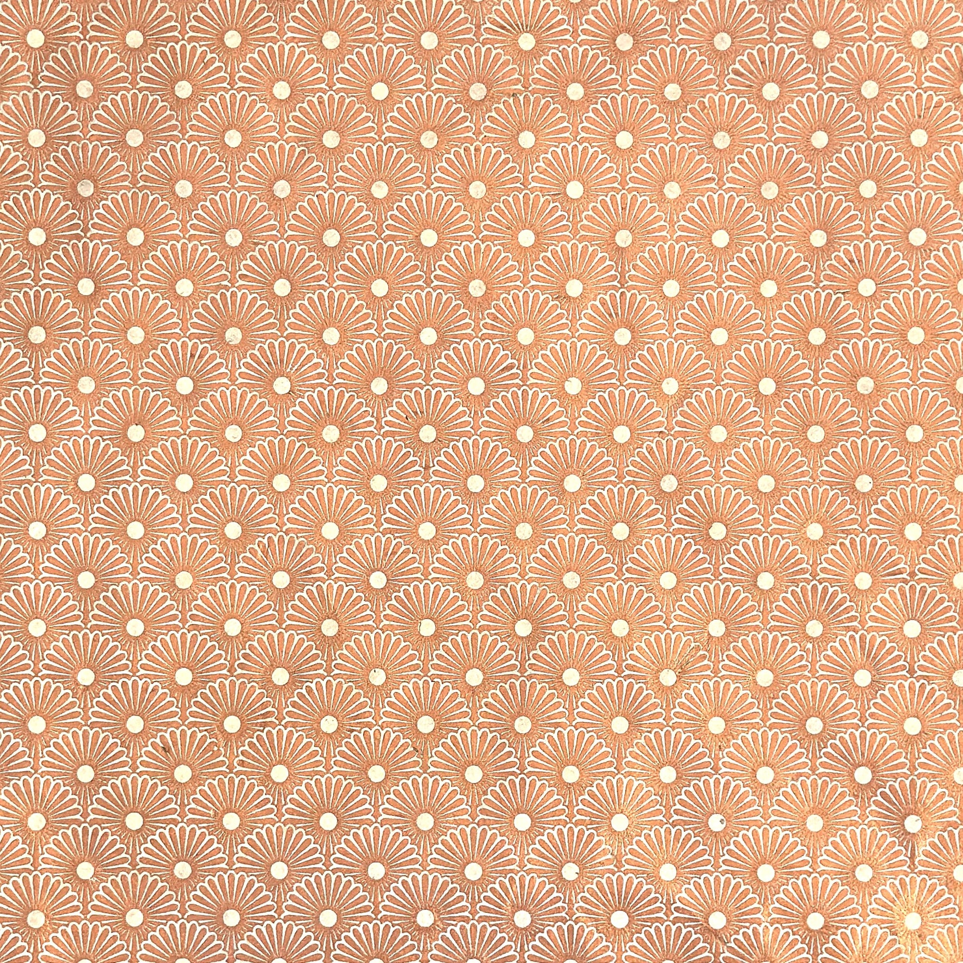 Nepalese handmade decorative lokta paper sheet with a copper metallic repeat floral pattern screen printed on an ivory lokta paper.