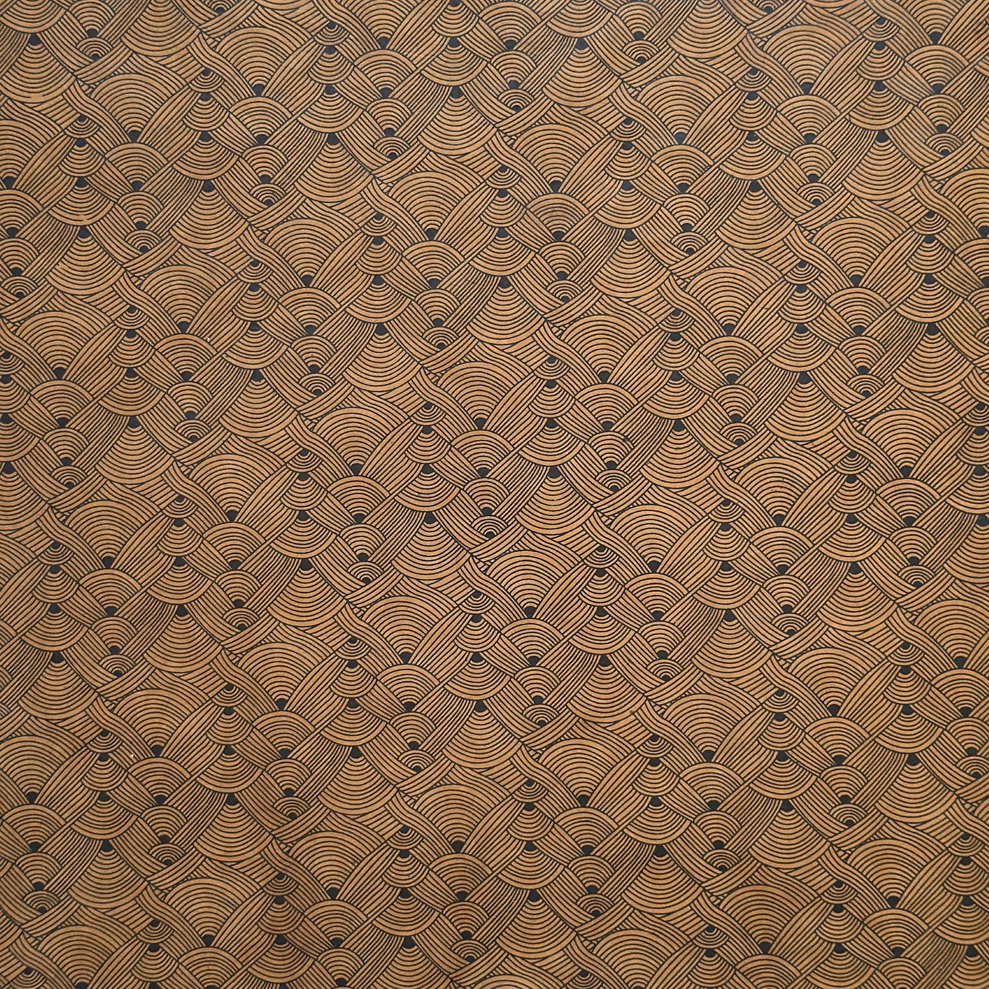 Nepalese handmade decorative lokta paper sheet with a fine lined black knots pattern screen printed on a brown lokta paper.